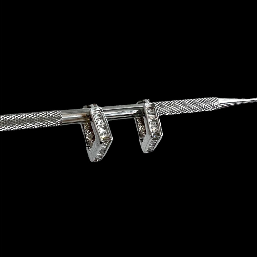 Silver tone faux baguette diamond pierced earrings